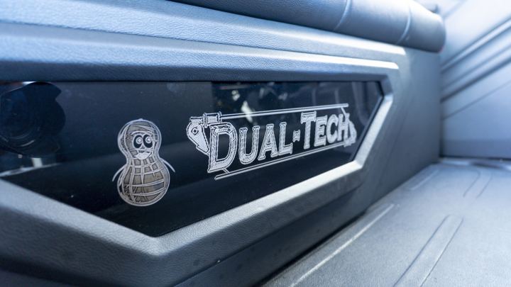 Dual-Tech badge