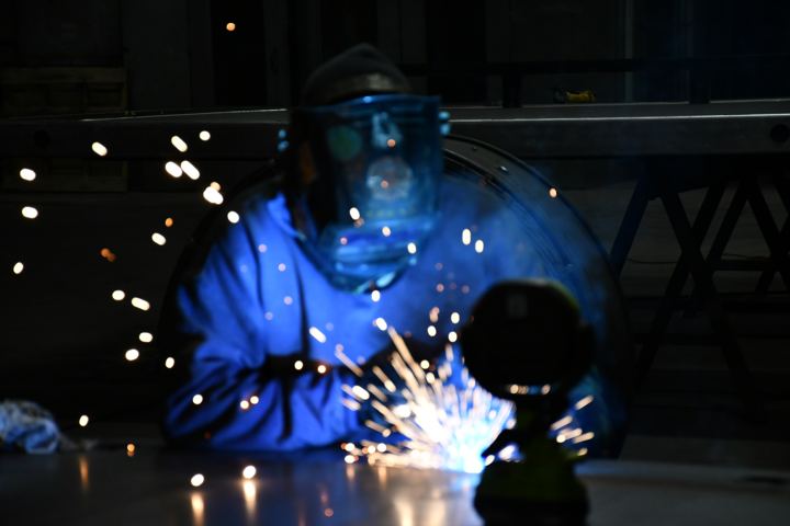 Welding in the Bean Station shop